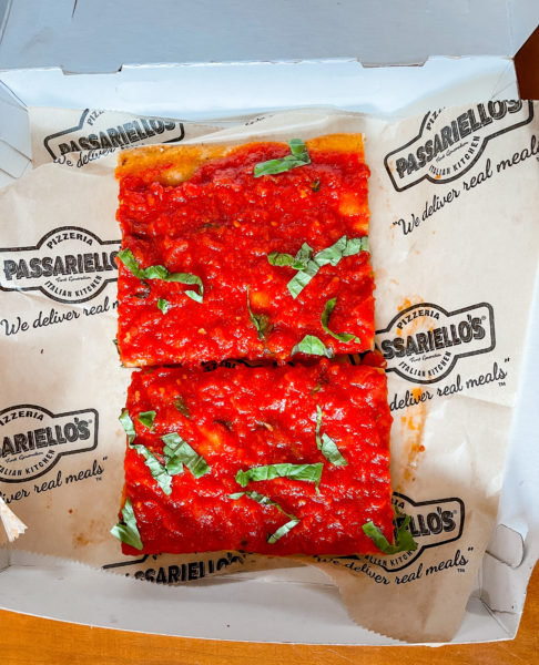 Passariello's tomato pie slices in box.