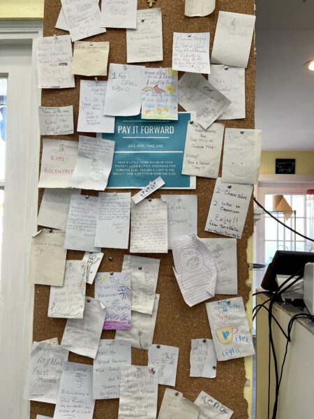The Pay it Forward bulletin board at Gracie's on Main.