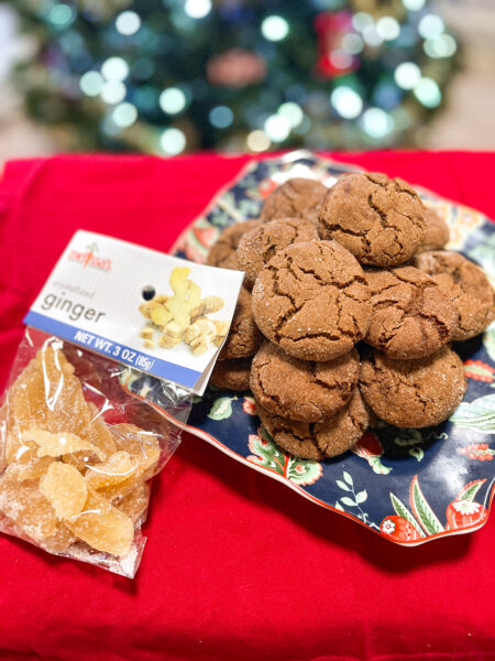 Cookies on plate next to candied ginger