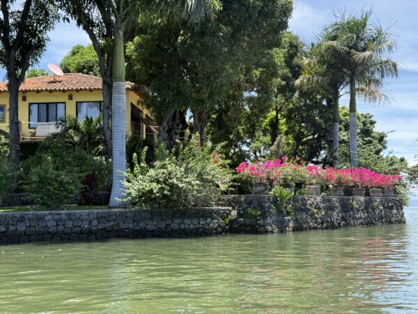View from water of home on tiny island.