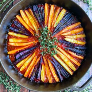 Carrot ratatouille in round baking pan.