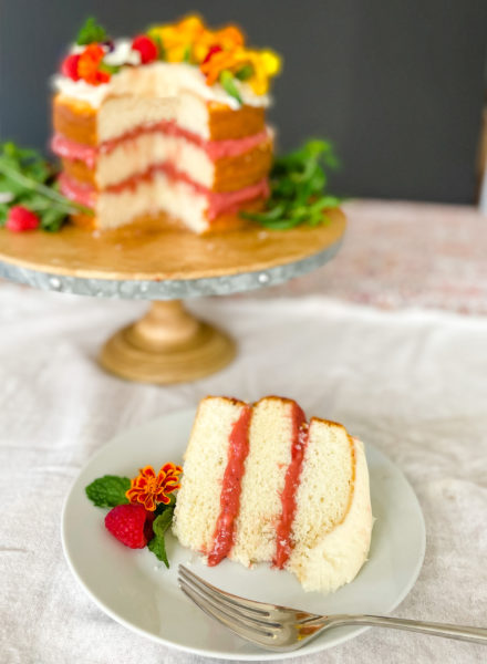 Slice of white cake with rhubarb curd filling